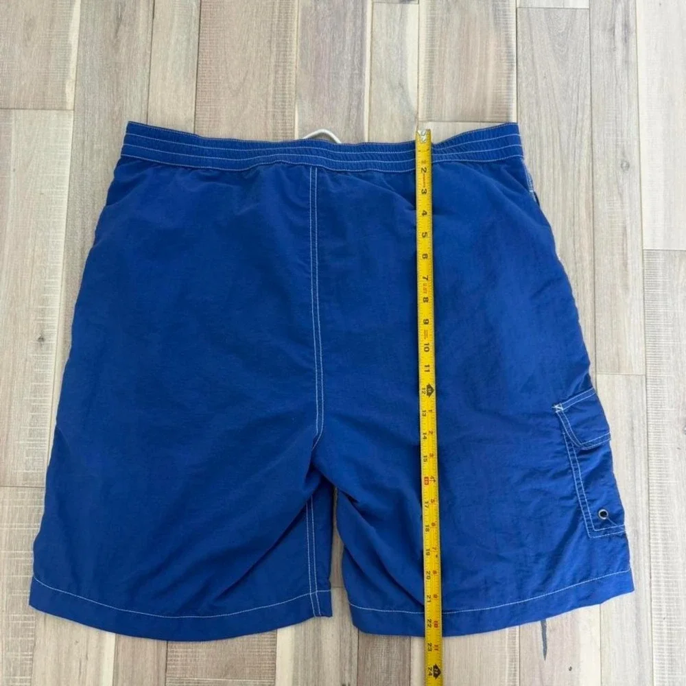 Y2K 2000s Ralph Lauren blue swim shorts with plaid lining. Size L